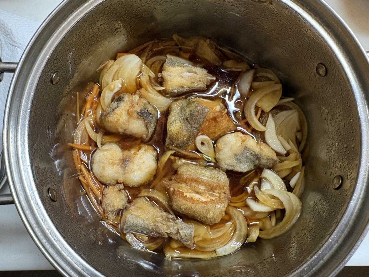 Fried kochi fish and vegetables marinating in nanban sauce in a pot