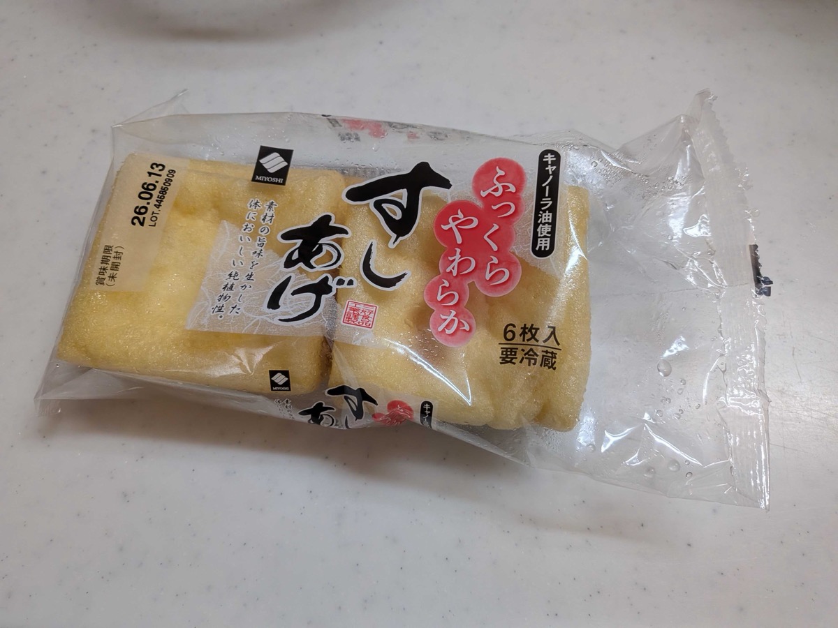 A pack of MIYOSHI sushi-age — pre-cut square aburaage tofu pouches, 6 pieces per pack, in clear plastic packaging