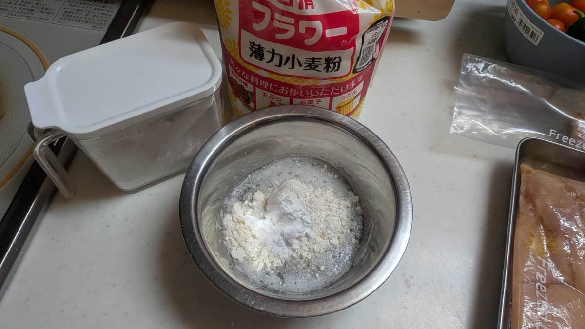 Cake flour and potato starch in a metal bowl for the tori ten batter