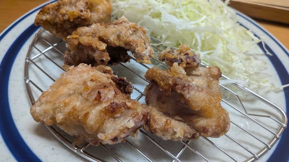 Close-up of air fryer karaage showing the craggy, crisp potato starch coating