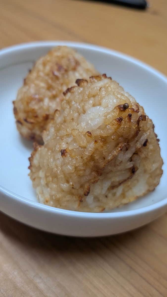 Air fryer yaki onigiri — Japanese grilled rice balls with a crisp golden crust, served on a small white plate